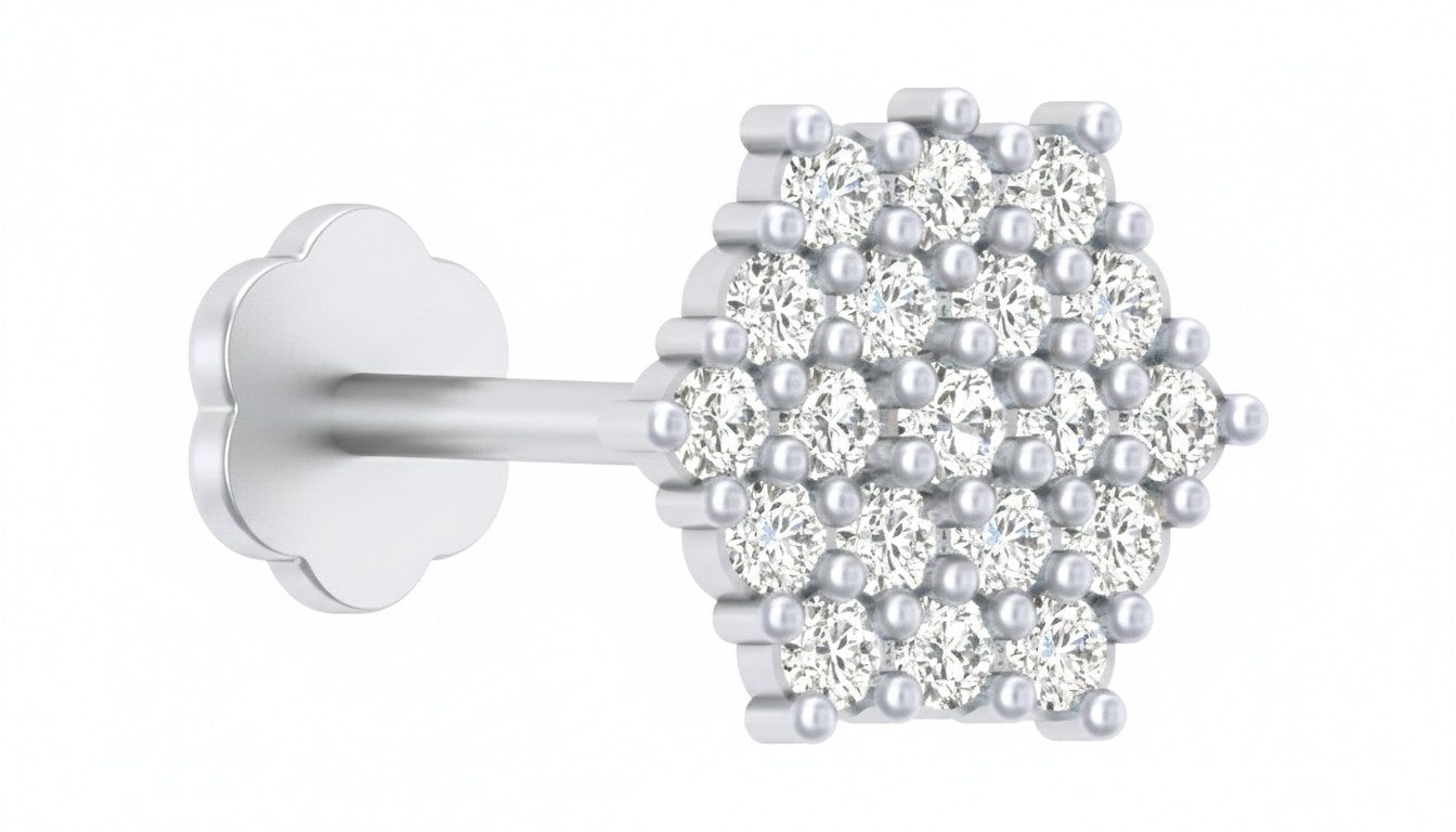 white gold and diamond stud nose pin on a white background