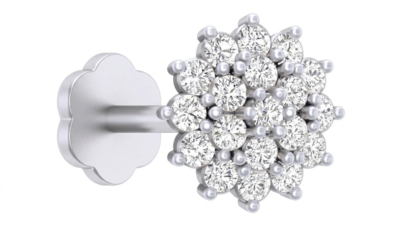 Pair of white gold and diamond stud nose pin on a white background.