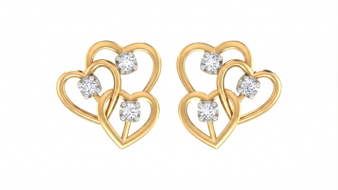 Yellow gold and diamond heart-shaped earrings on a white background