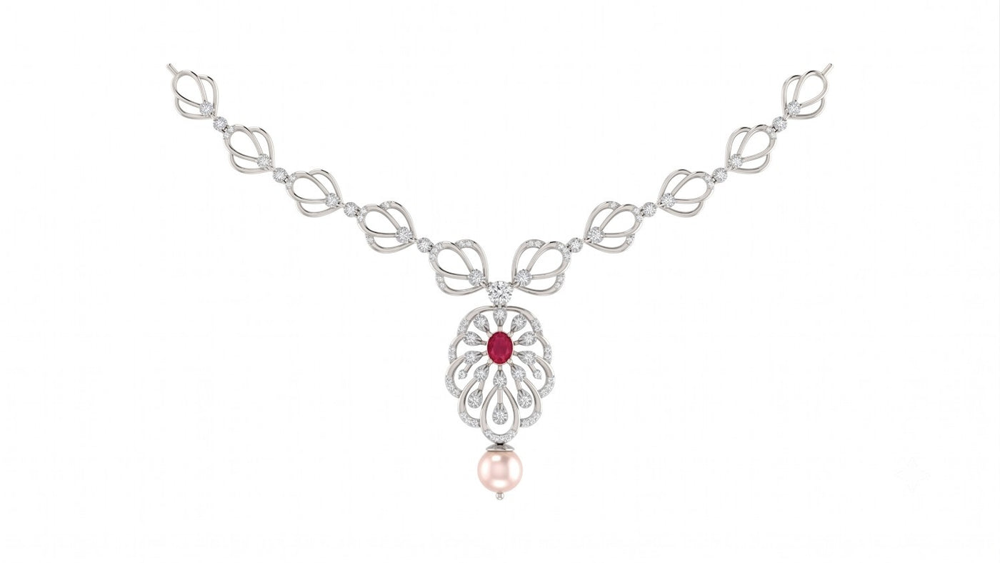A white gold and diamond necklace featuring a central pendant with a red ruby stone, clear diamond accents, set against a plain white background.