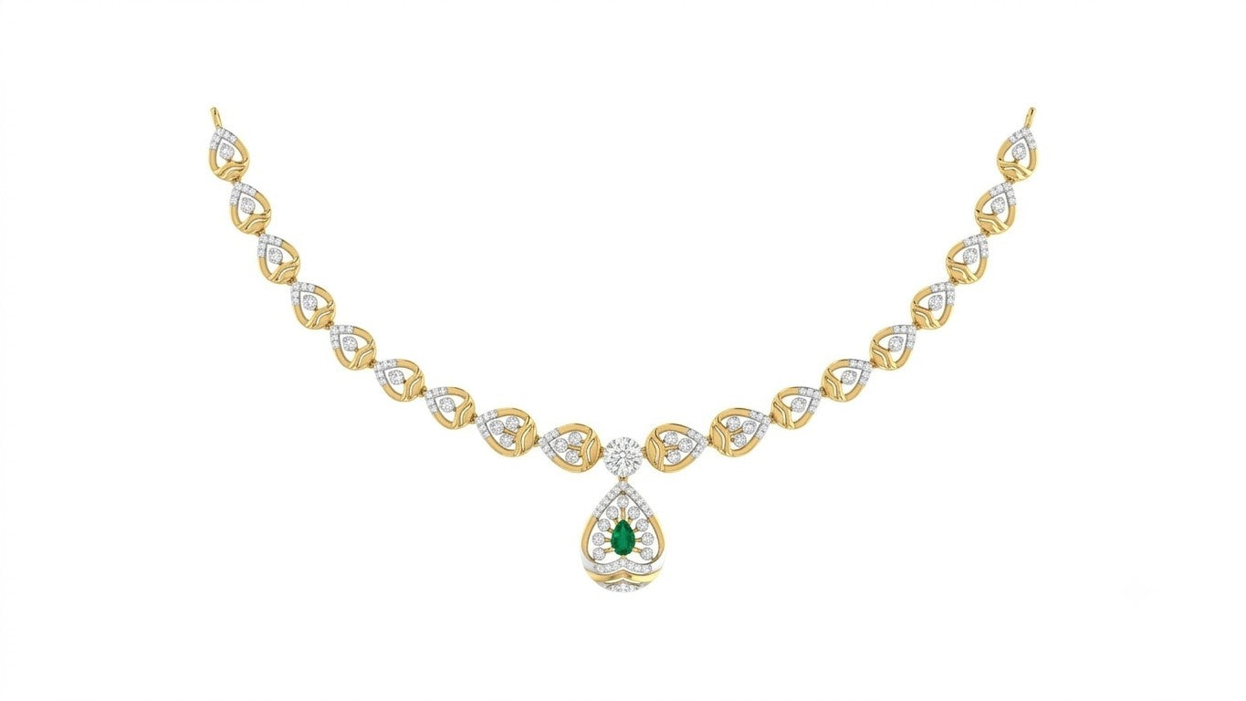 A yellow gold and diamond necklace with a central teardrop-shaped green emerald pendant, displayed on a clean white background.