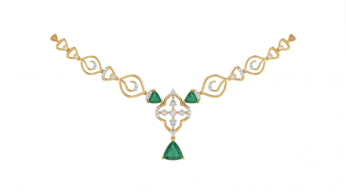 Yellow gold and diamond necklace with three trillion-cut emeralds, diamond accents, and floral-design.