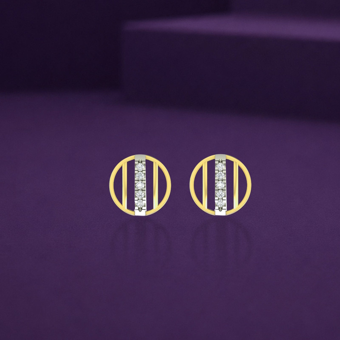 A pair of round, two-tone gold and diamond stud earrings on a dark purple background