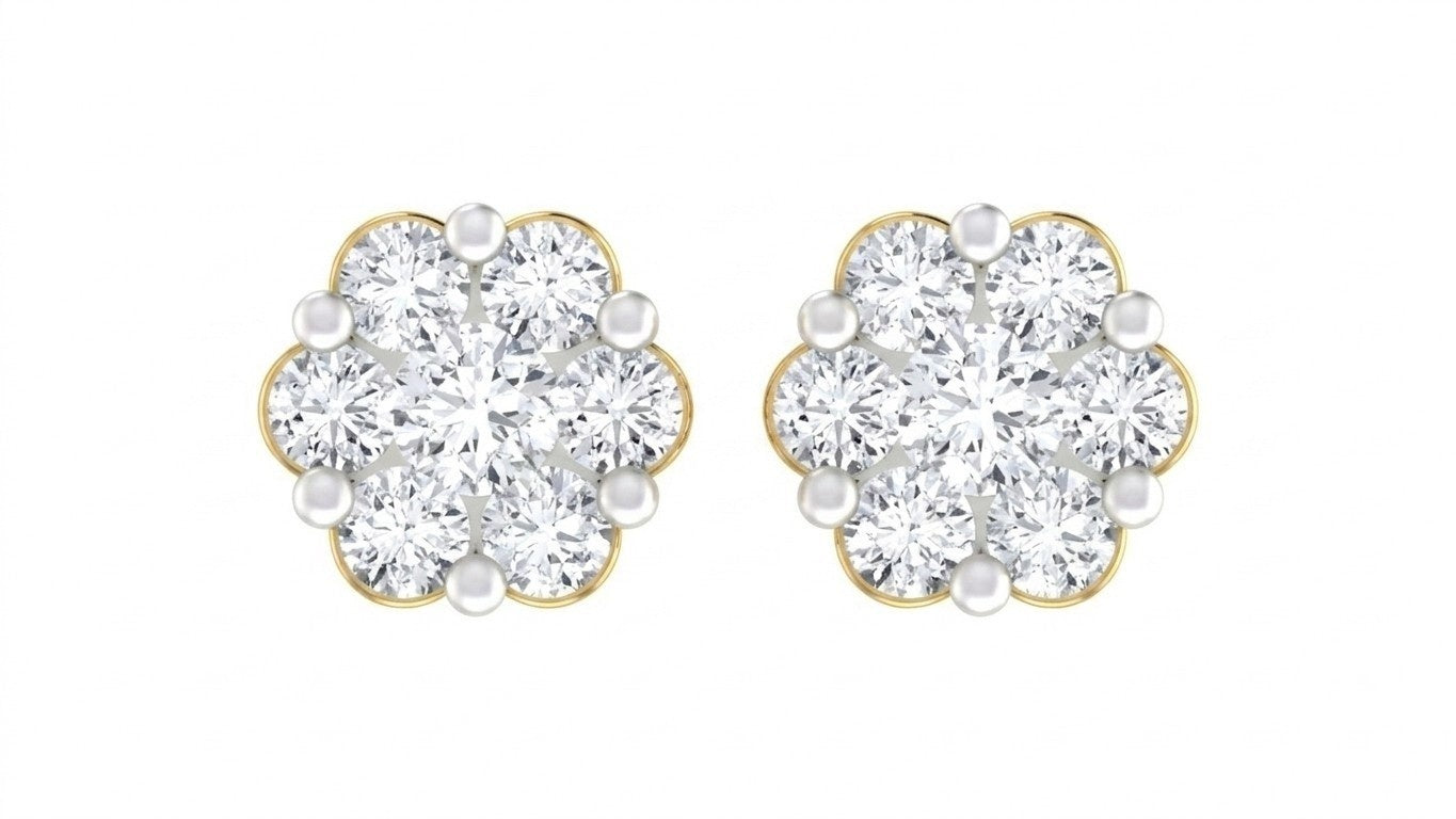 Pair of yellow gold and diamond earrings with floral design on a white background.