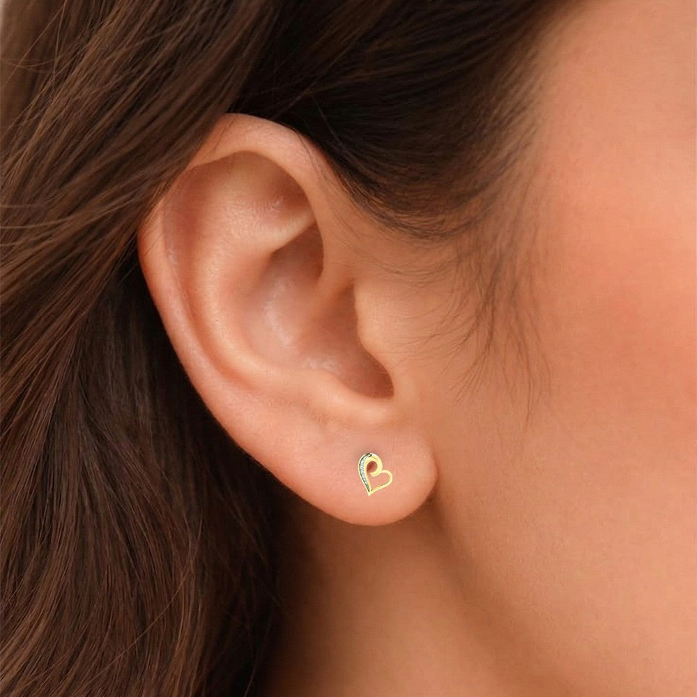 Close-up shot of a heart-shaped stud earring.