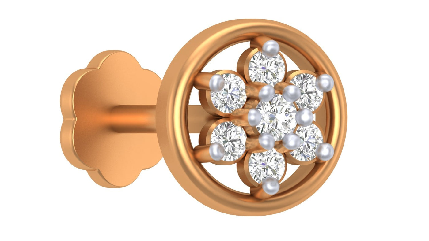Yellow gold and diamond stud nose pin on a white background