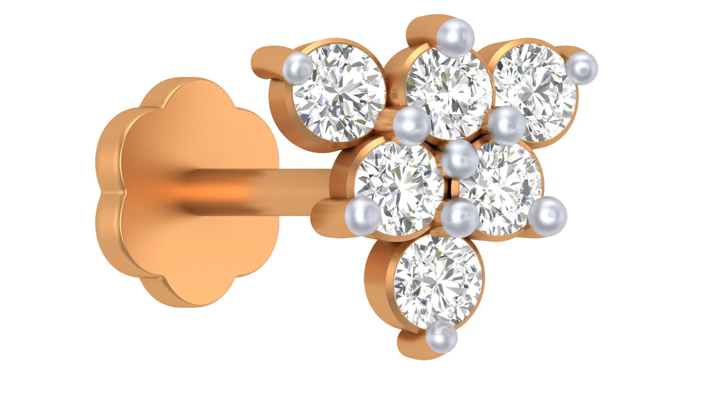 Yellow Gold and diamond stud nose pin-like stones on a white background