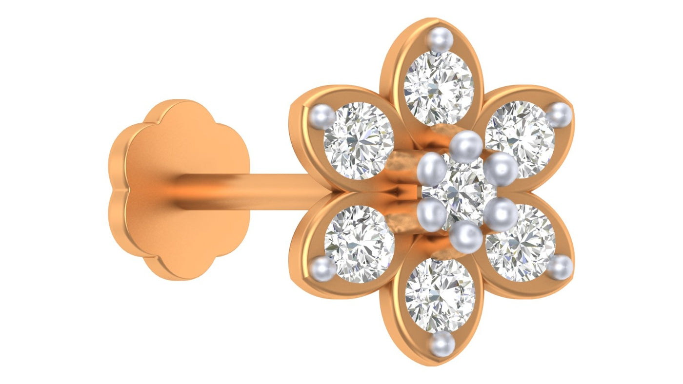 Yellow gold and diamond stud nose pin on a white background