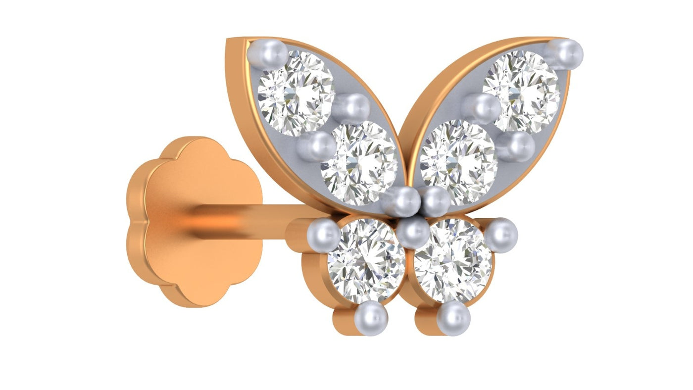 Butterfly-shaped Yellow gold diamond and stud nose pin-like stones on a white background