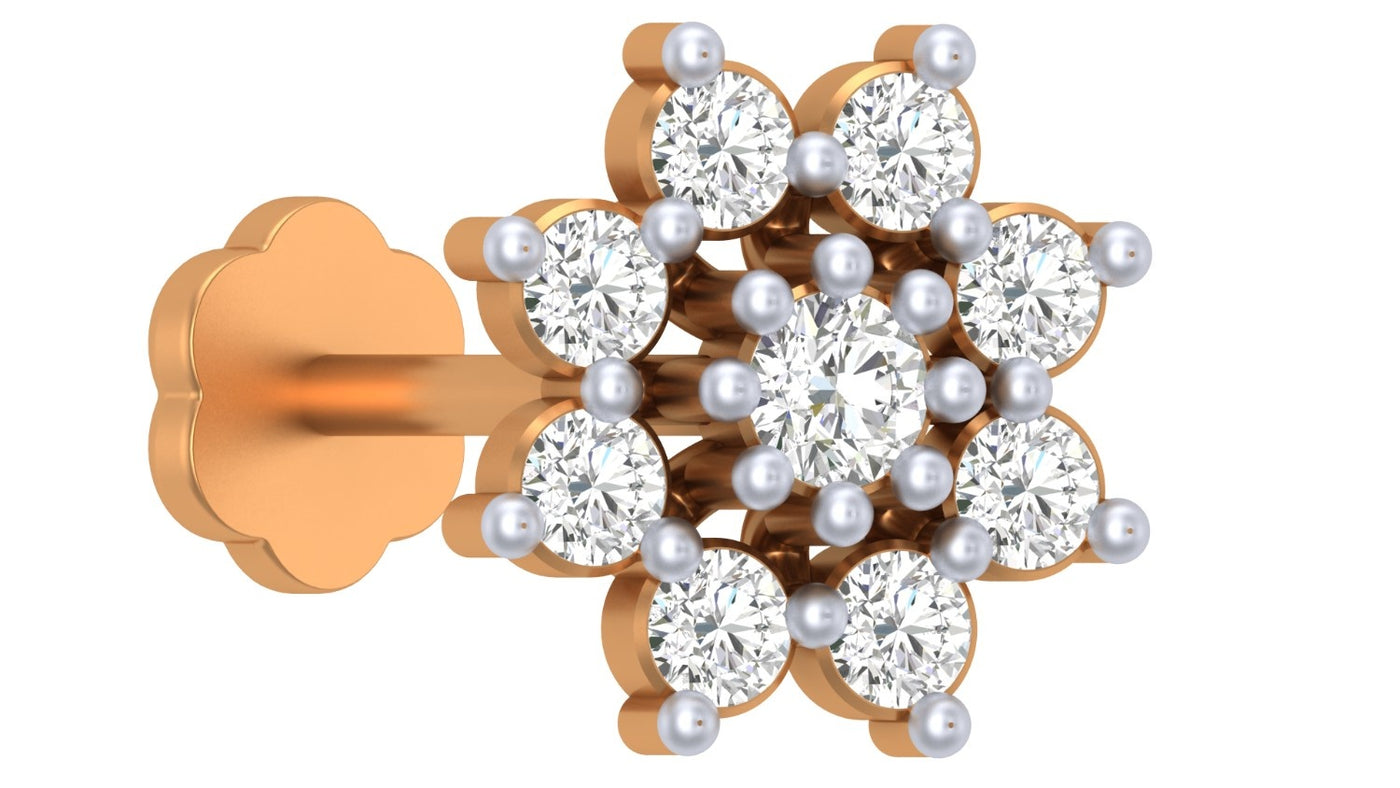 Yellow gold and diamond stud nose pin on a white background