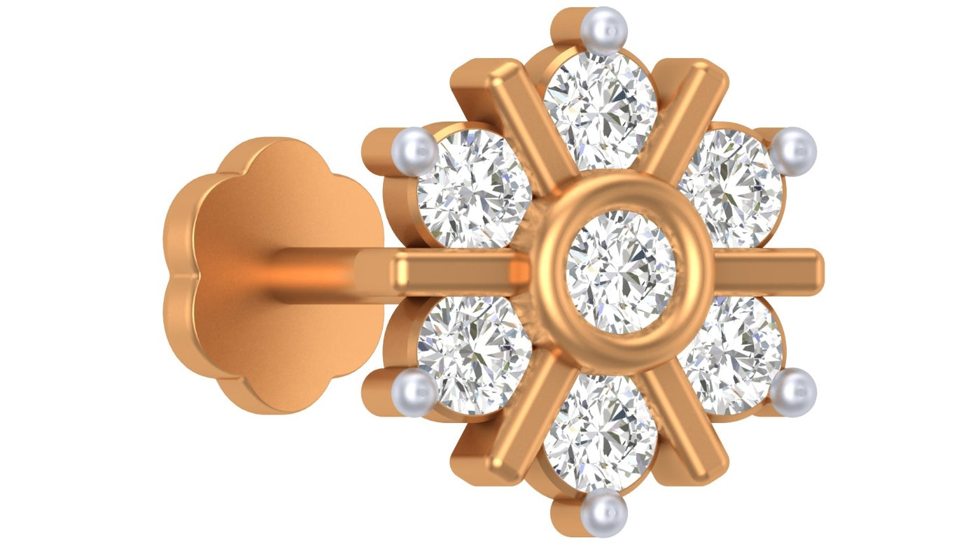 Yellow gold and diamond stud nose pin on a white background