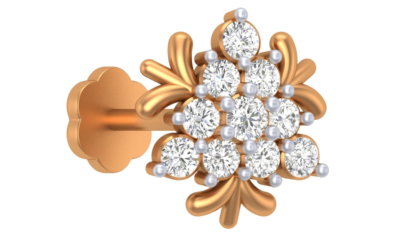 Yellow gold and diamond nose pin-like stones on a white background
