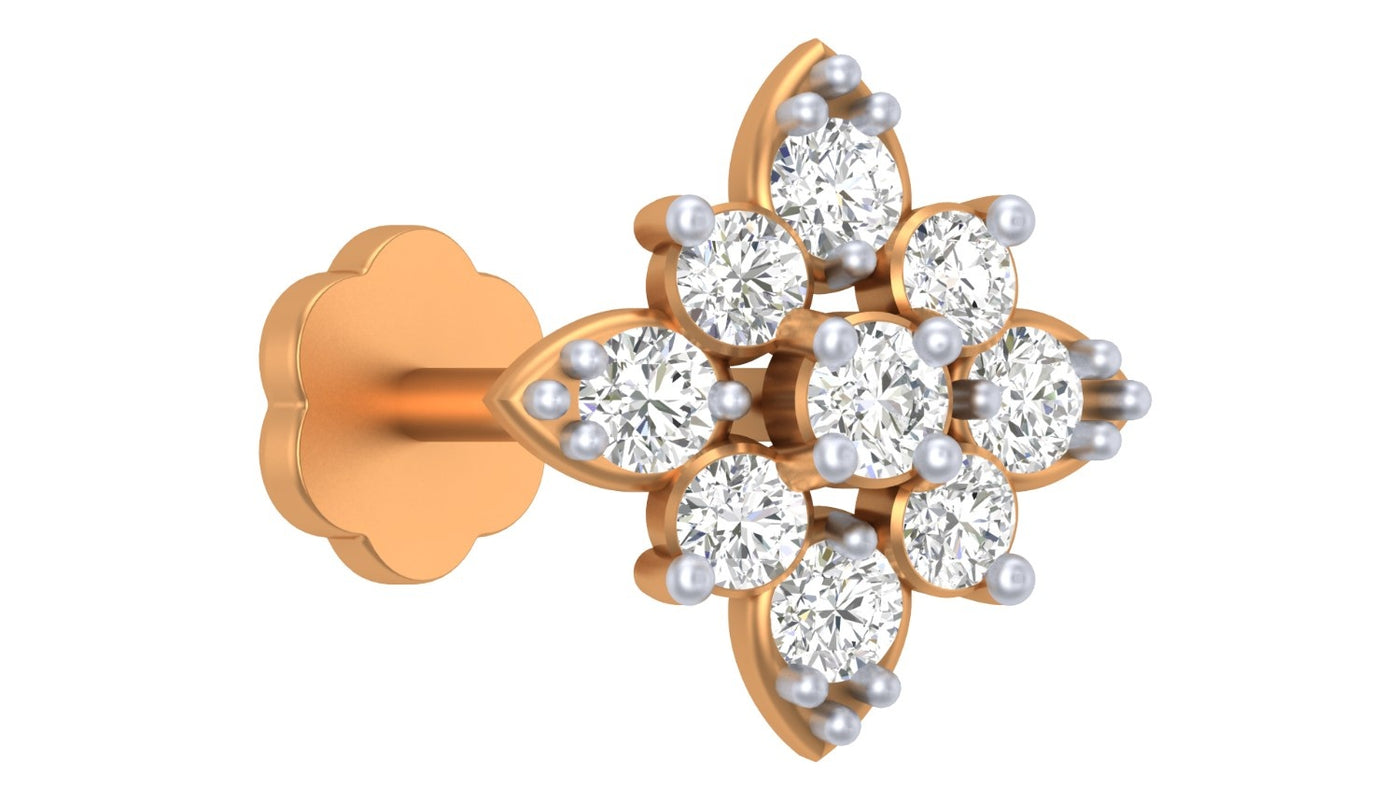 Yellow gold and diamond stud nose pin on a white background