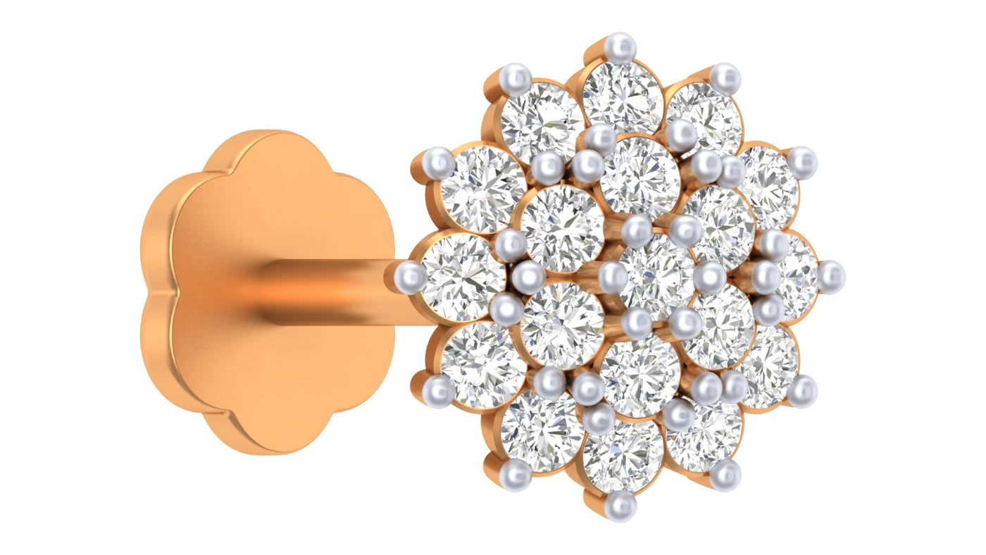 Pair of yellow gold and diamond stud nose pin on a white background.