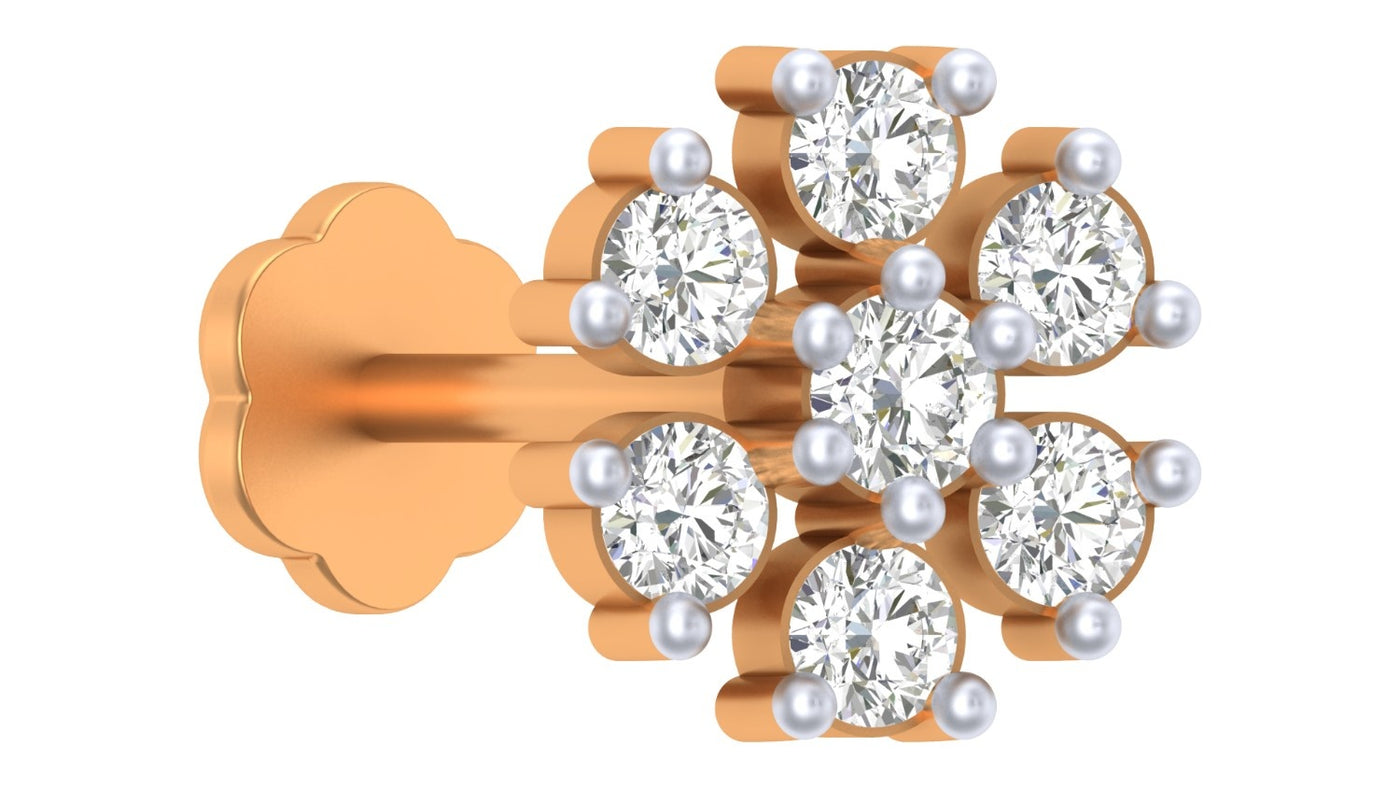 yellow gold and diamond stud nose pin on a white background
