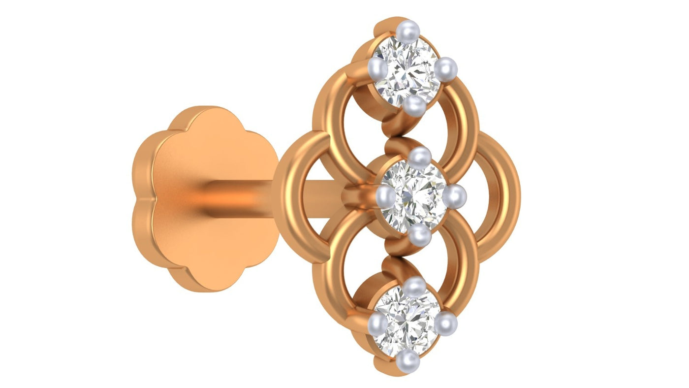 yellow gold and diamond stud nose pin with floral design on a white background
