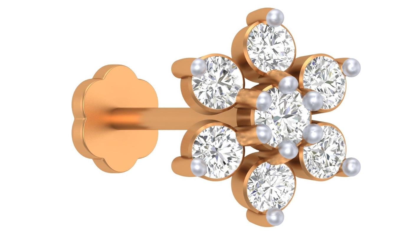 yellow gold and diamond stud nose pin on a white background