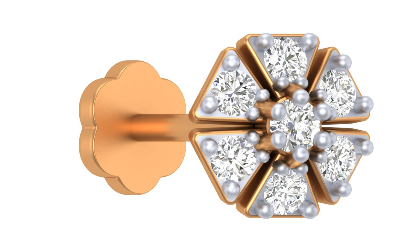 Yellow gold and diamond stud nose pin on a white background