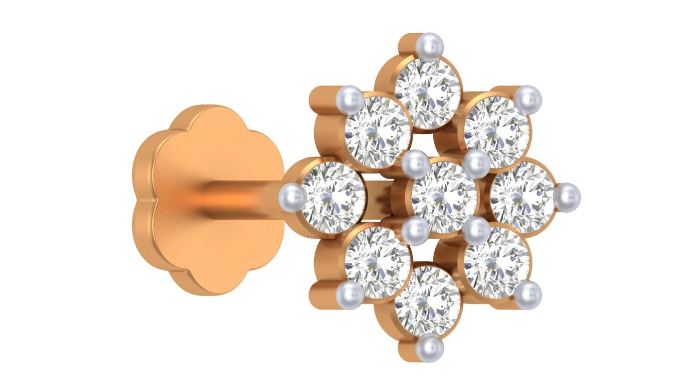 Yellow gold and diamond stud nose pin with clear gemstones on a white background