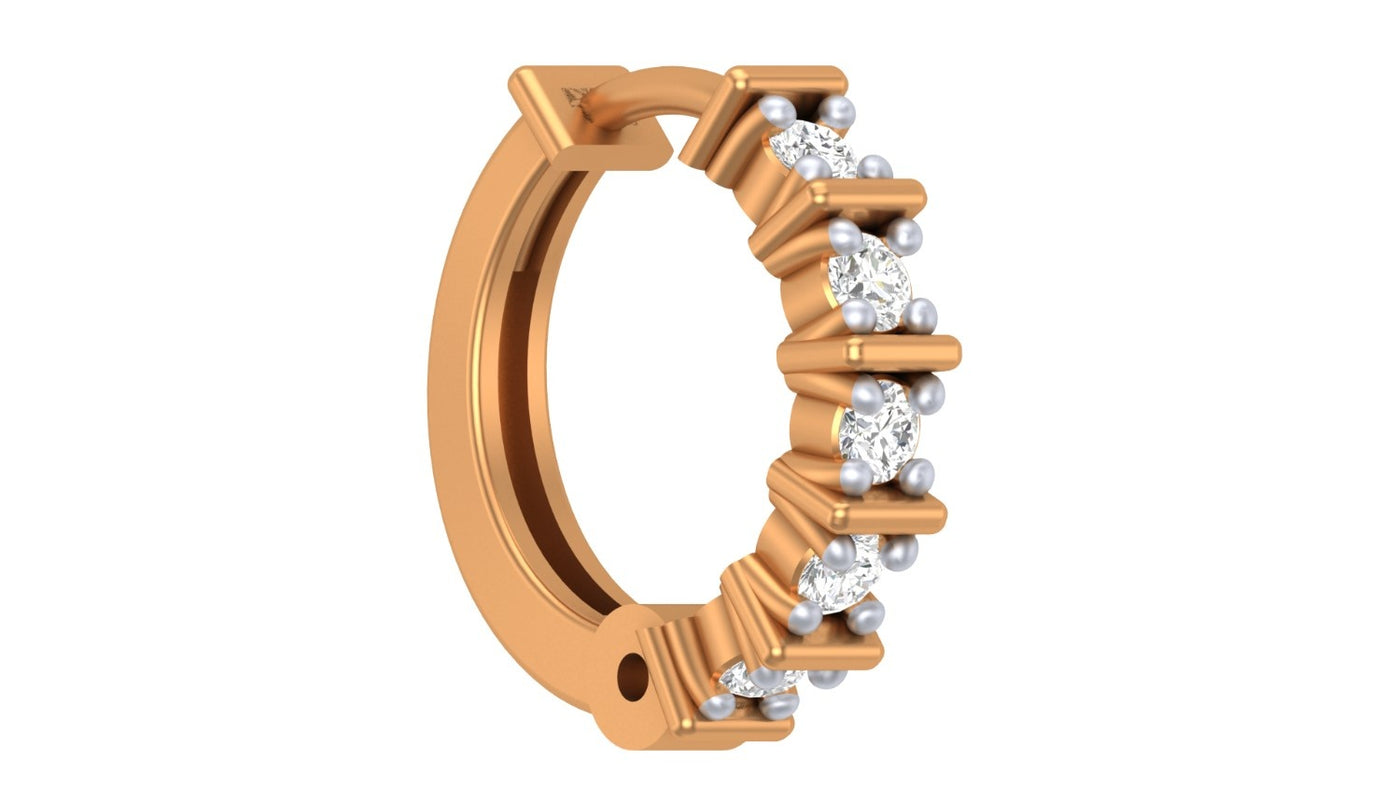 yellow gold and diamond nose ring with diamonds on a white background