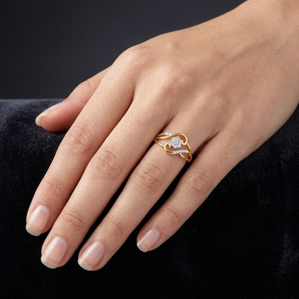 Close-up shot of a gold and diamond with floral cluster ring.