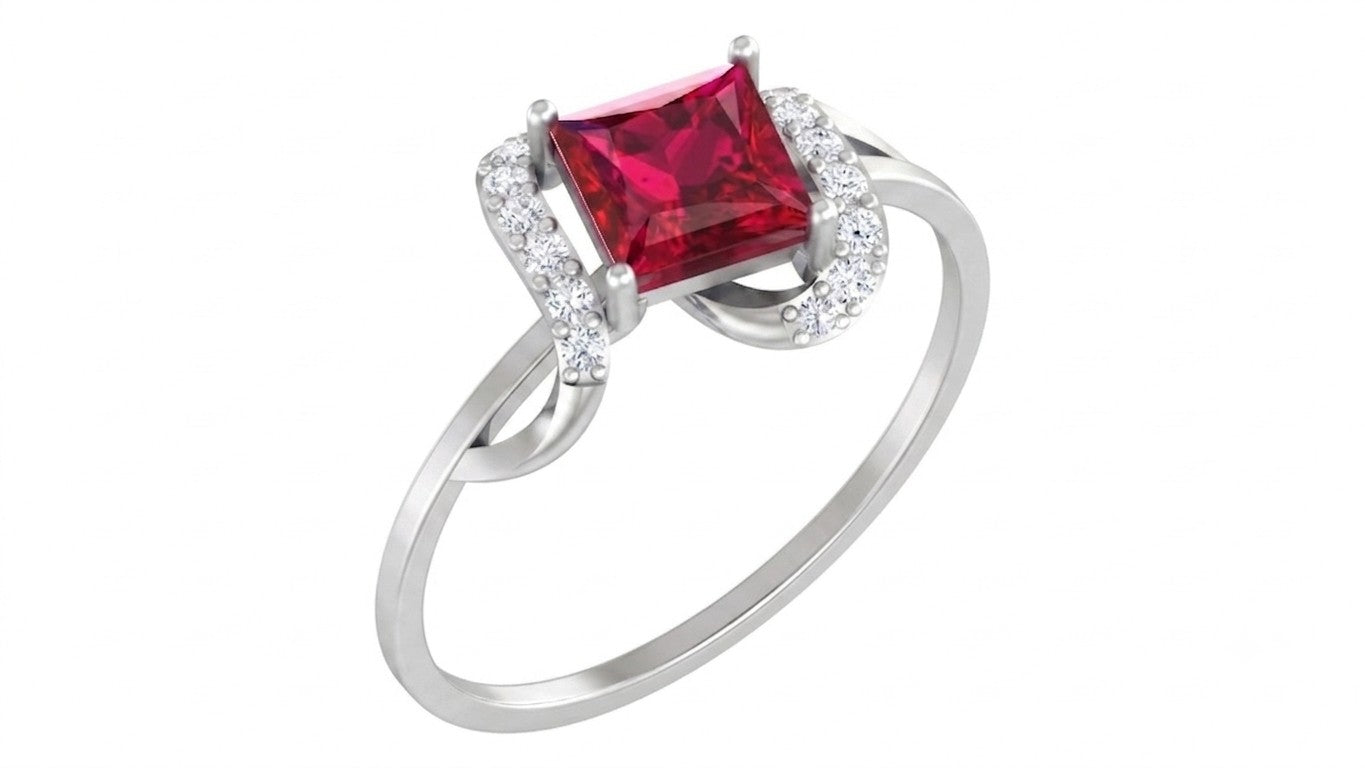 A white gold ring featuring a square-cut ruby gemstone, shown on a plain white background.