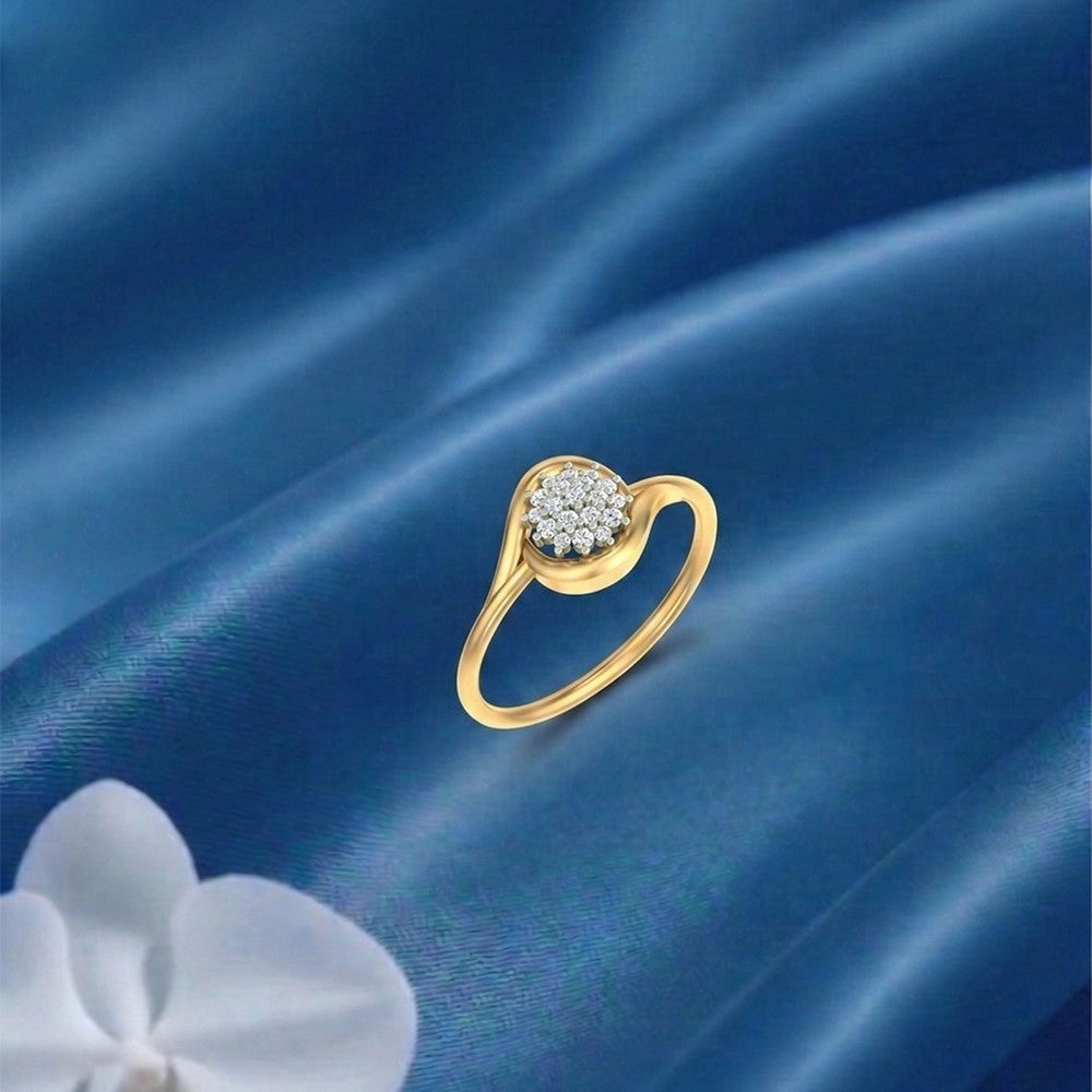 Gold and diamond with floral design on a blue fabric surface.