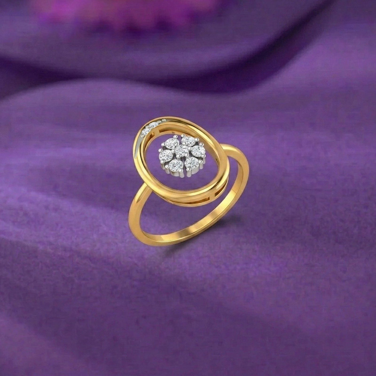 Gold and diamond with center floral cluster on a purple surface.