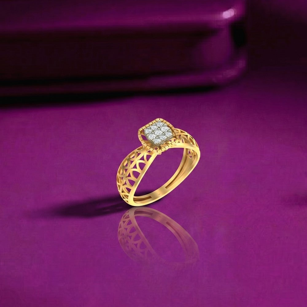 Gold and diamond with cluster setting on a purple surface.