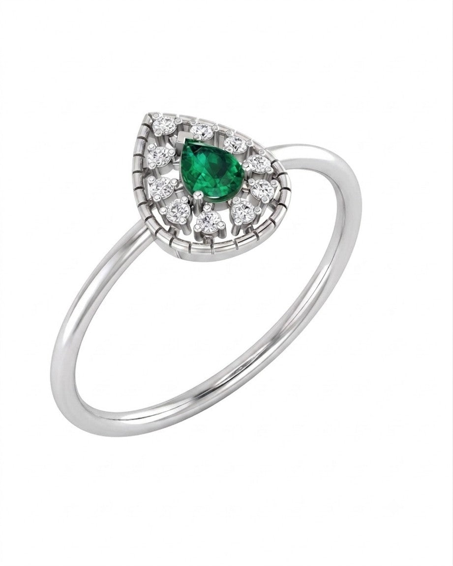 White gold and diamond with teardrop emerald gemstone setting on a white background.