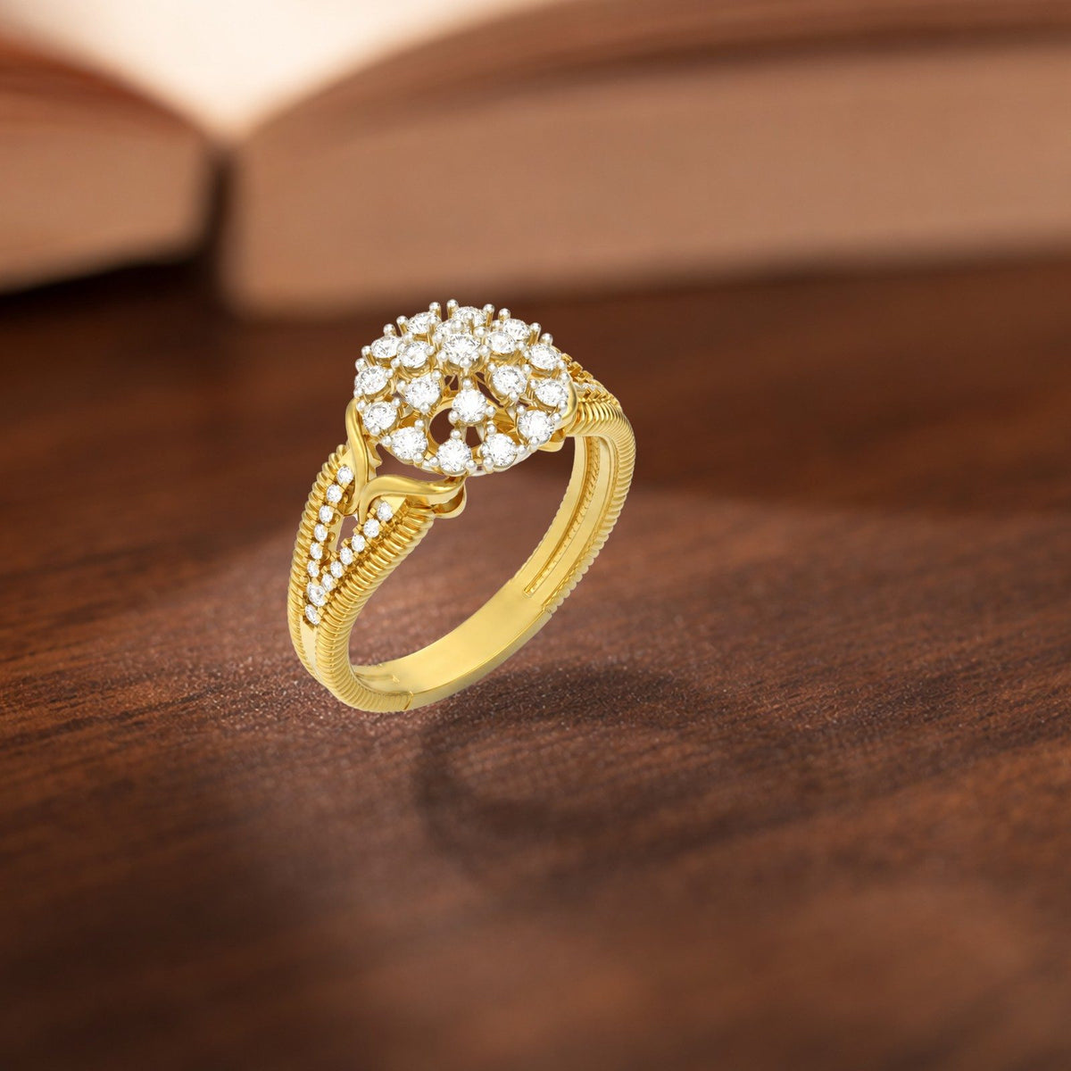 Gold and diamond with cluster setting on a wooden surface.