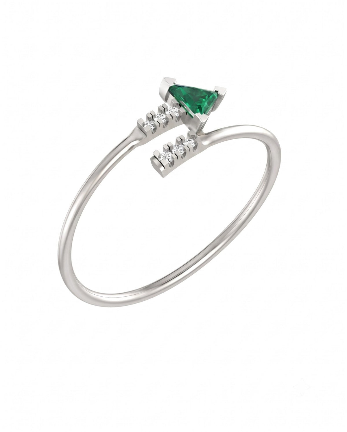 White gold ring with a emerald gemstone and smaller diamonds on a white background