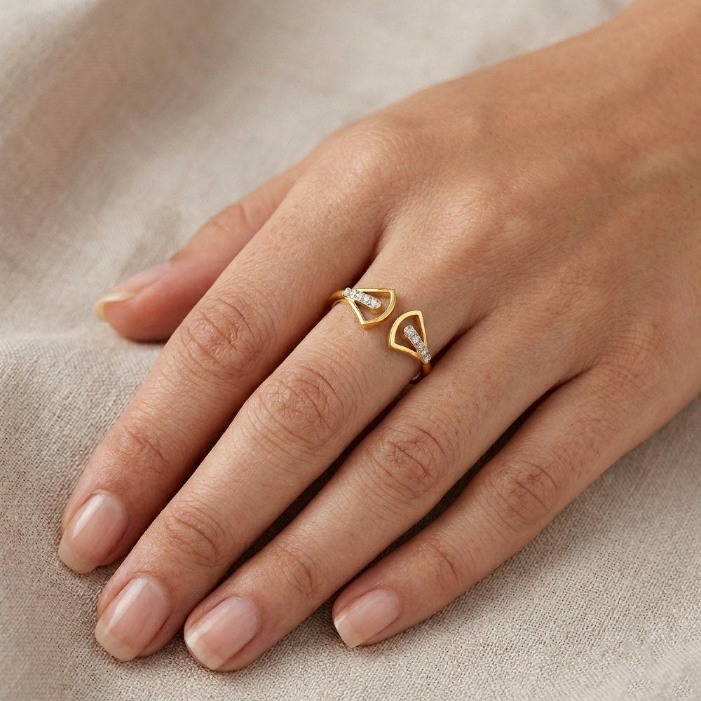 Close-up shot of a Yellow gold and diamond with cuff ring.