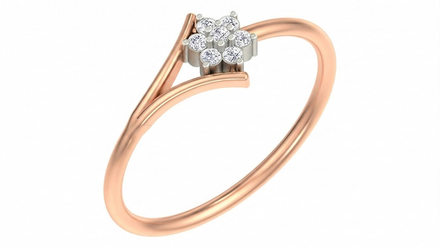 Rose gold and diamond with floral-design cluster setting on a white background.