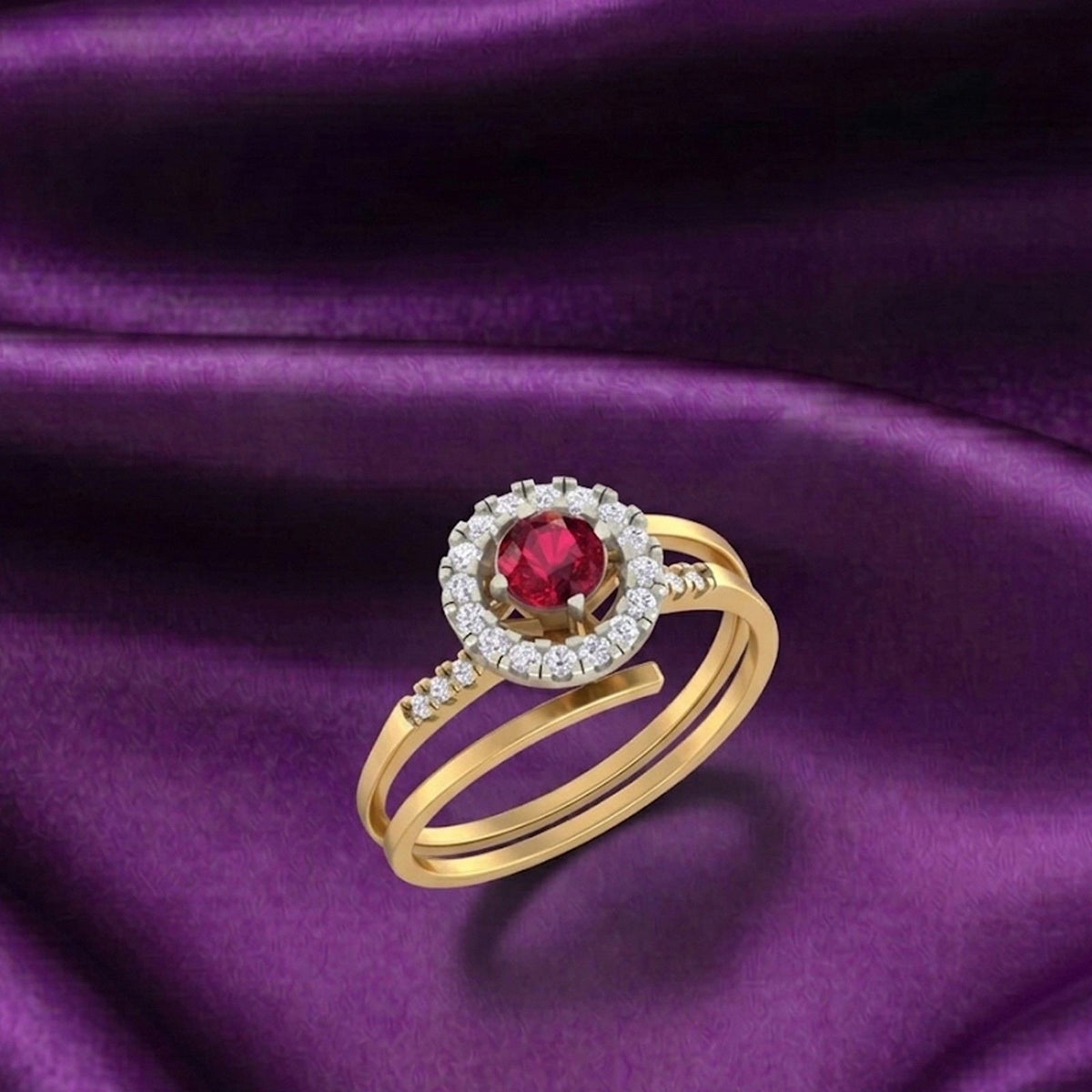 Gold and diamond with ruby gemstone on a purple surface.