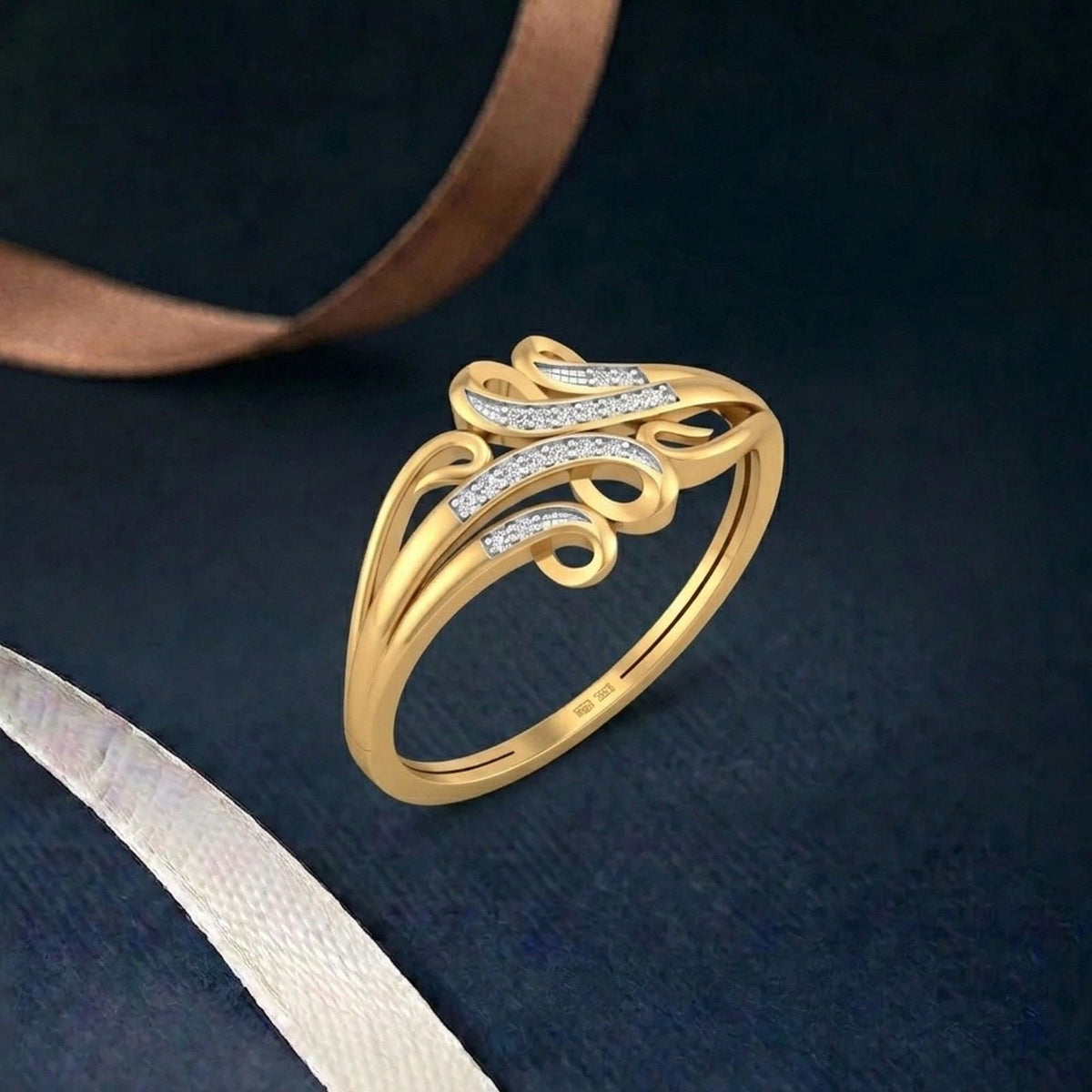 Gold ring with a diamond on a hand against a beige fabric background.