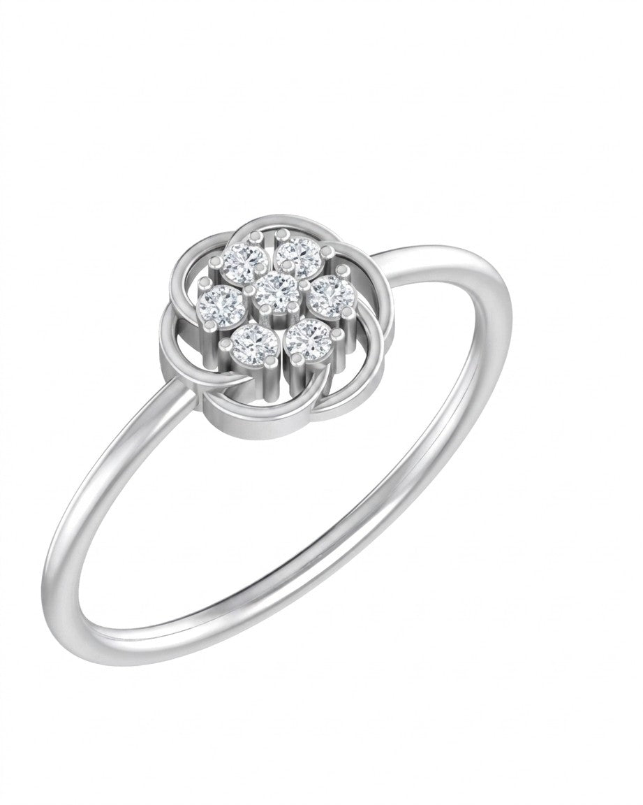 A white gold ring featuring a flower-shaped pavé setting, shown on a plain white background.