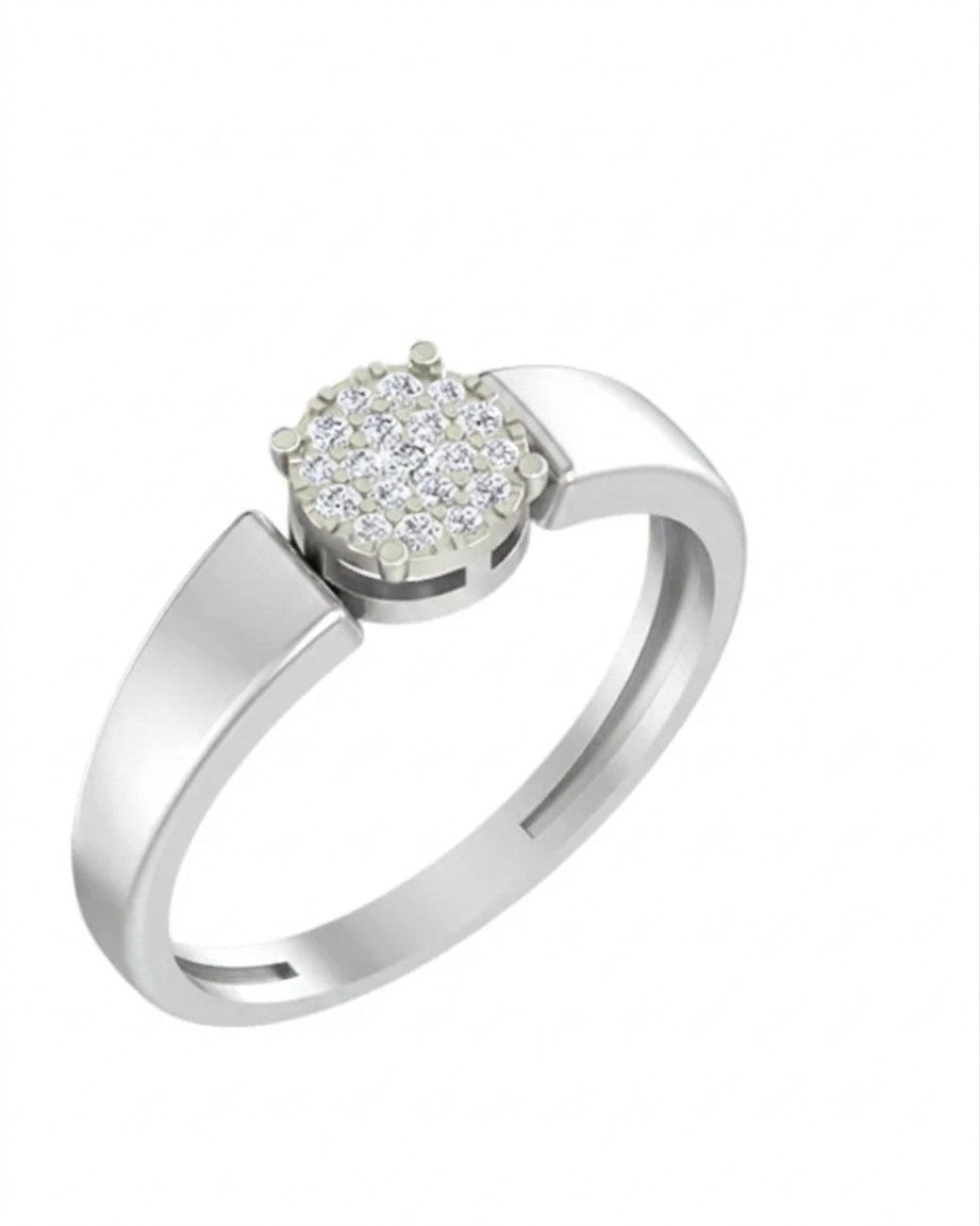 White gold ring with a diamond-like center on a white background