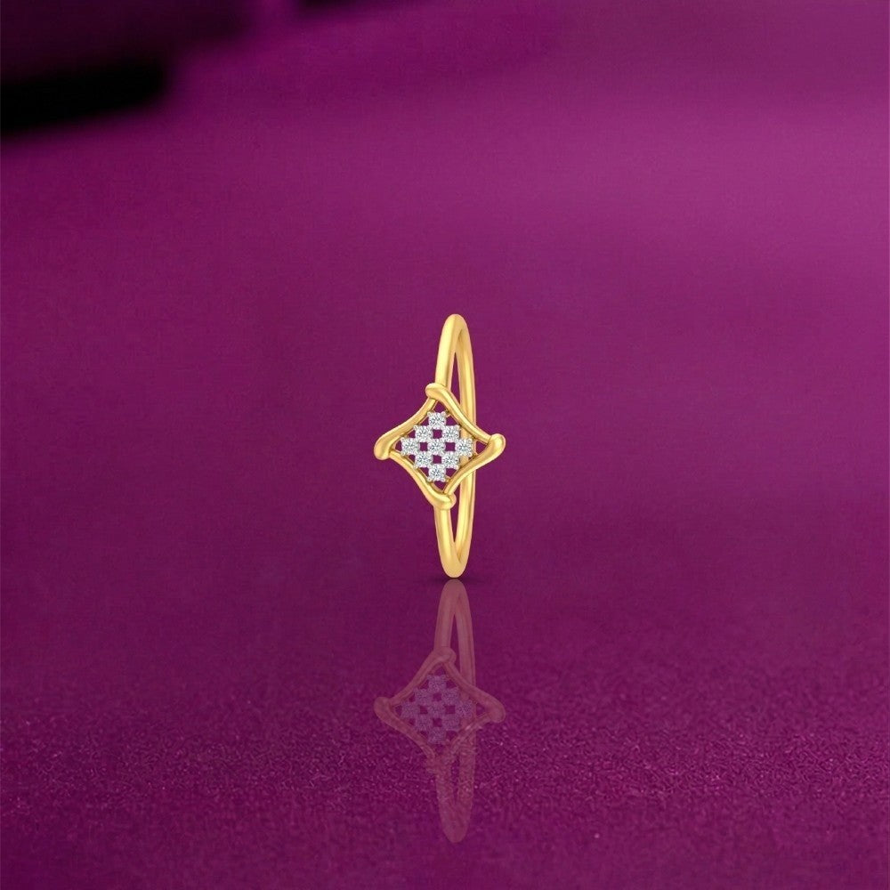 Gold and diamond with cluster setting on a reflective surface.
