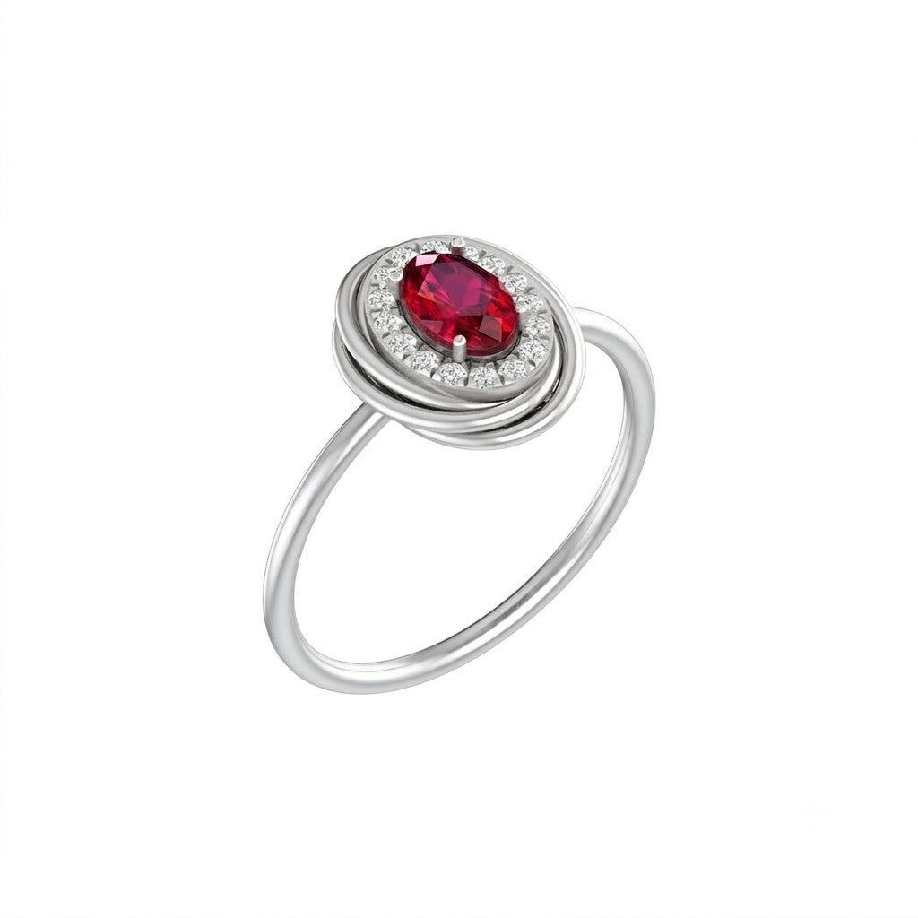 White gold and diamond with ruby gemstone ring on a white background.