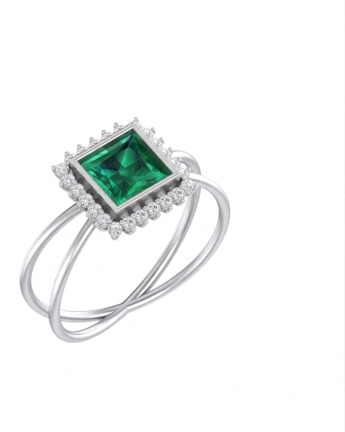 White gold and diamond with emerald gemstone ring on a white background.