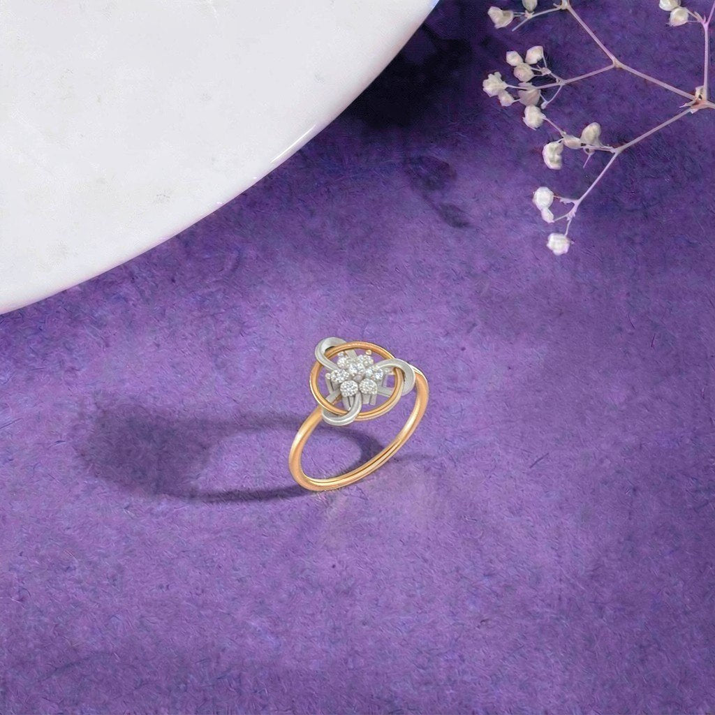 Gold and diamond with floral design on a blue surface.