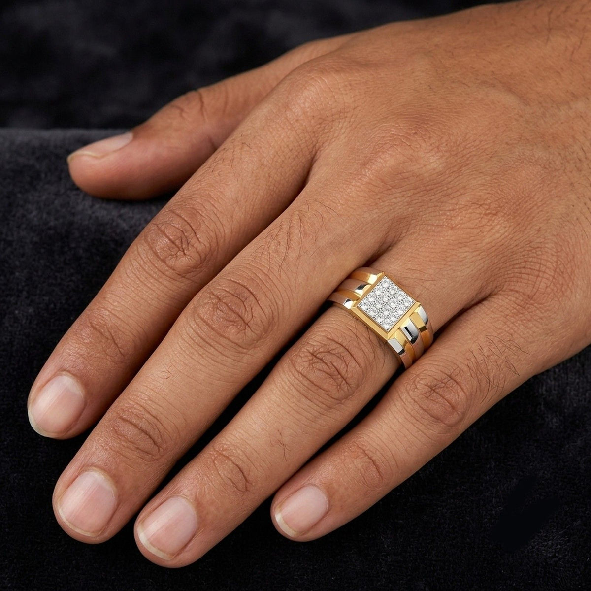 Close-up shots of a gold and diamond ring.
