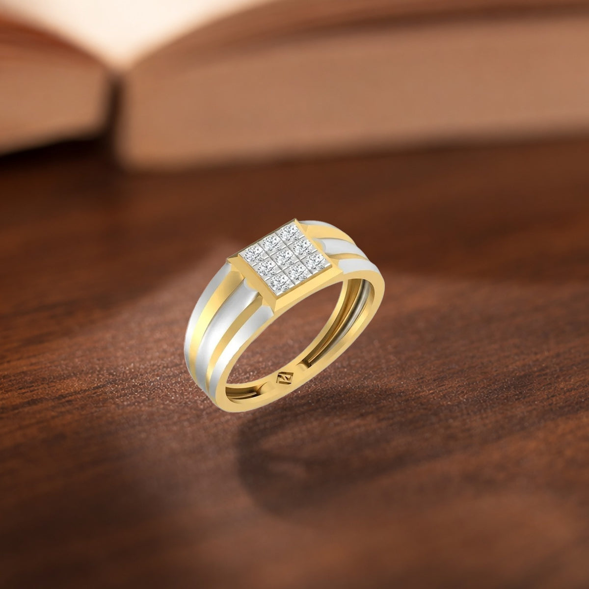 Gold ring with diamond accents on a reflective surface.