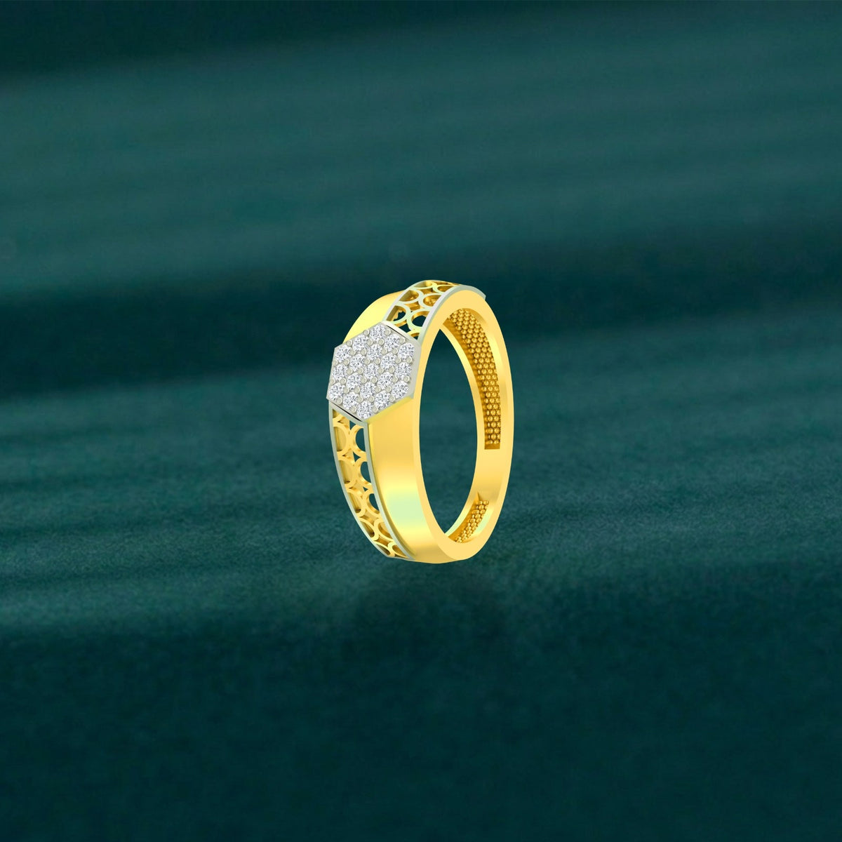 Gold and diamond men's ring on a wooden surface.