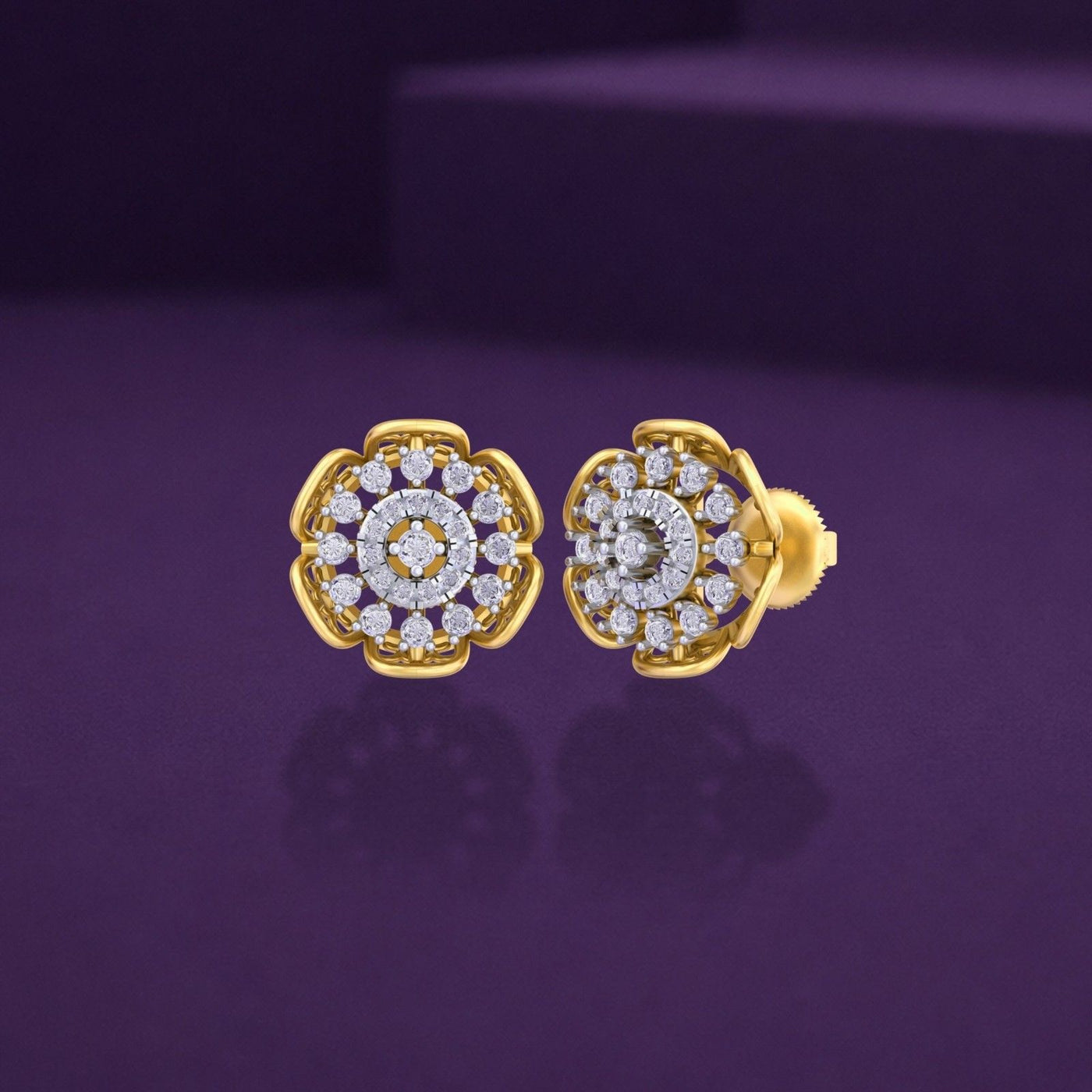 Gold stud earrings with intricate floral designs, shown from both front and side angles on a purple background.