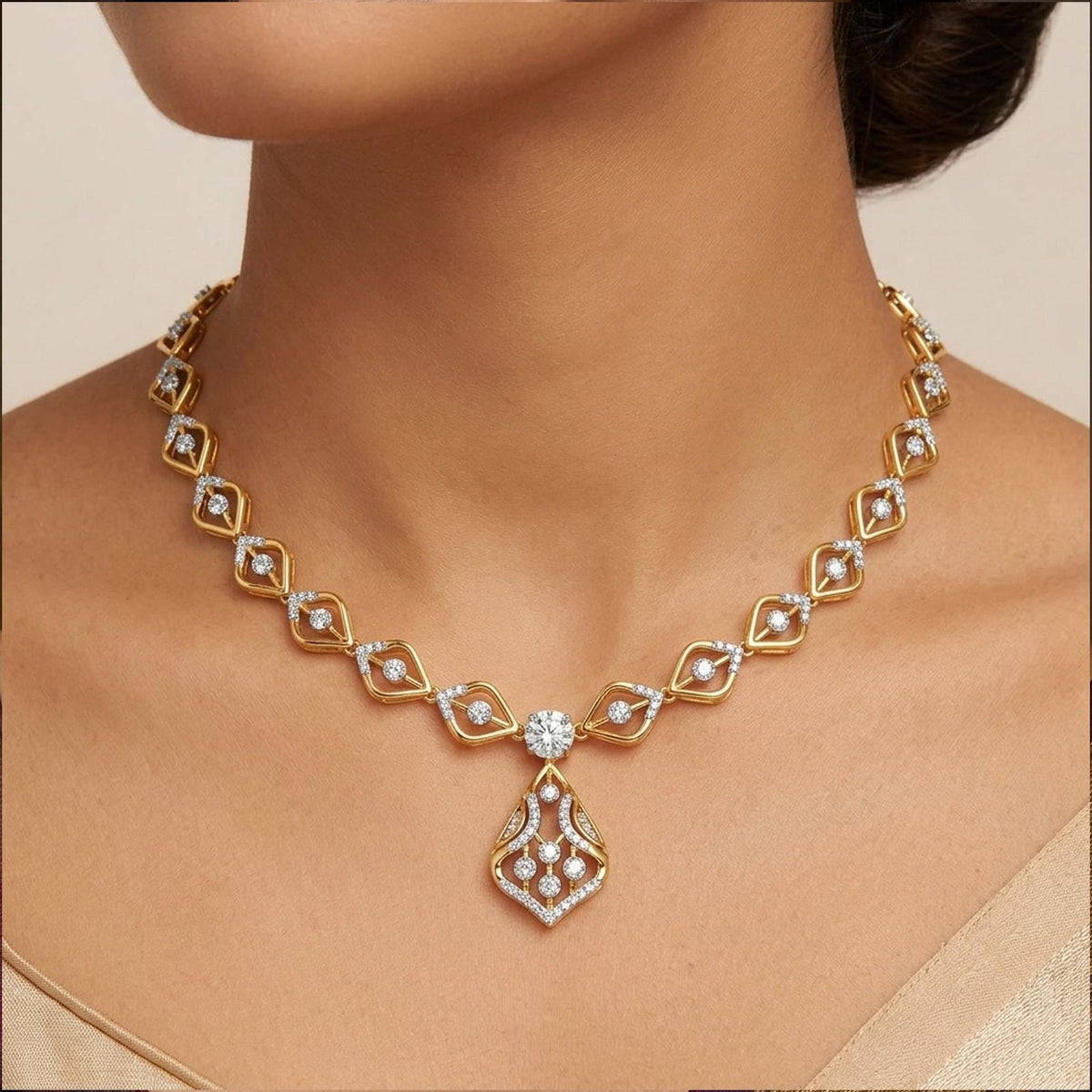 A gold and diamond necklace with a teardrop-shaped, worn on a model's neck.