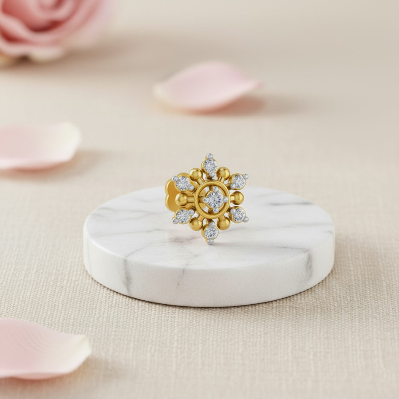 An intricate gold and diamond stud jewelry piece with a floral motif