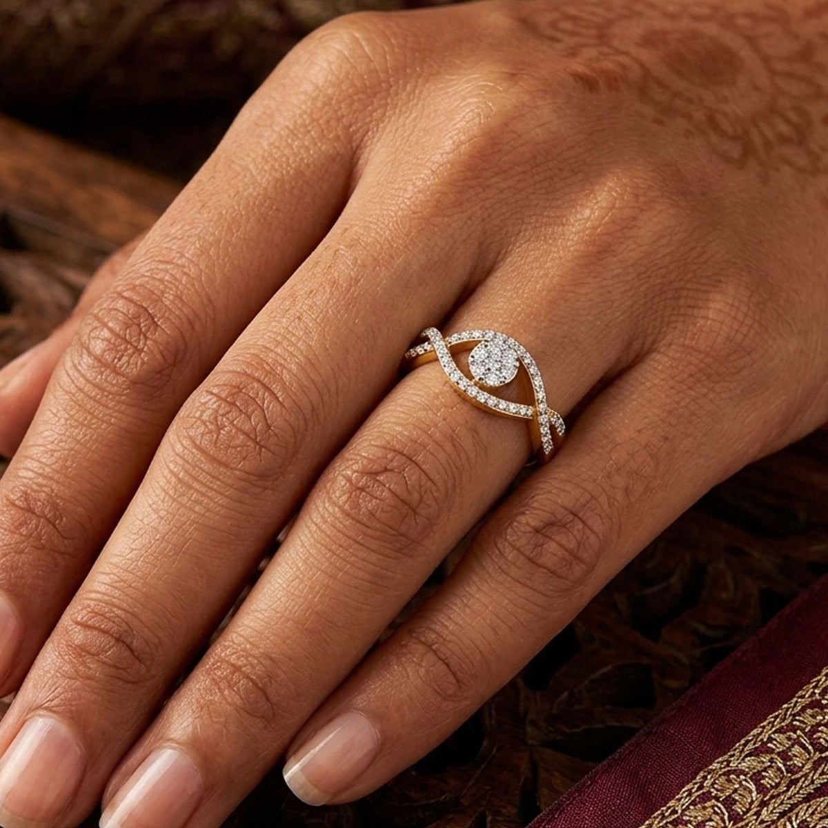 Close-up shot of a gold and diamond with cluster setting.