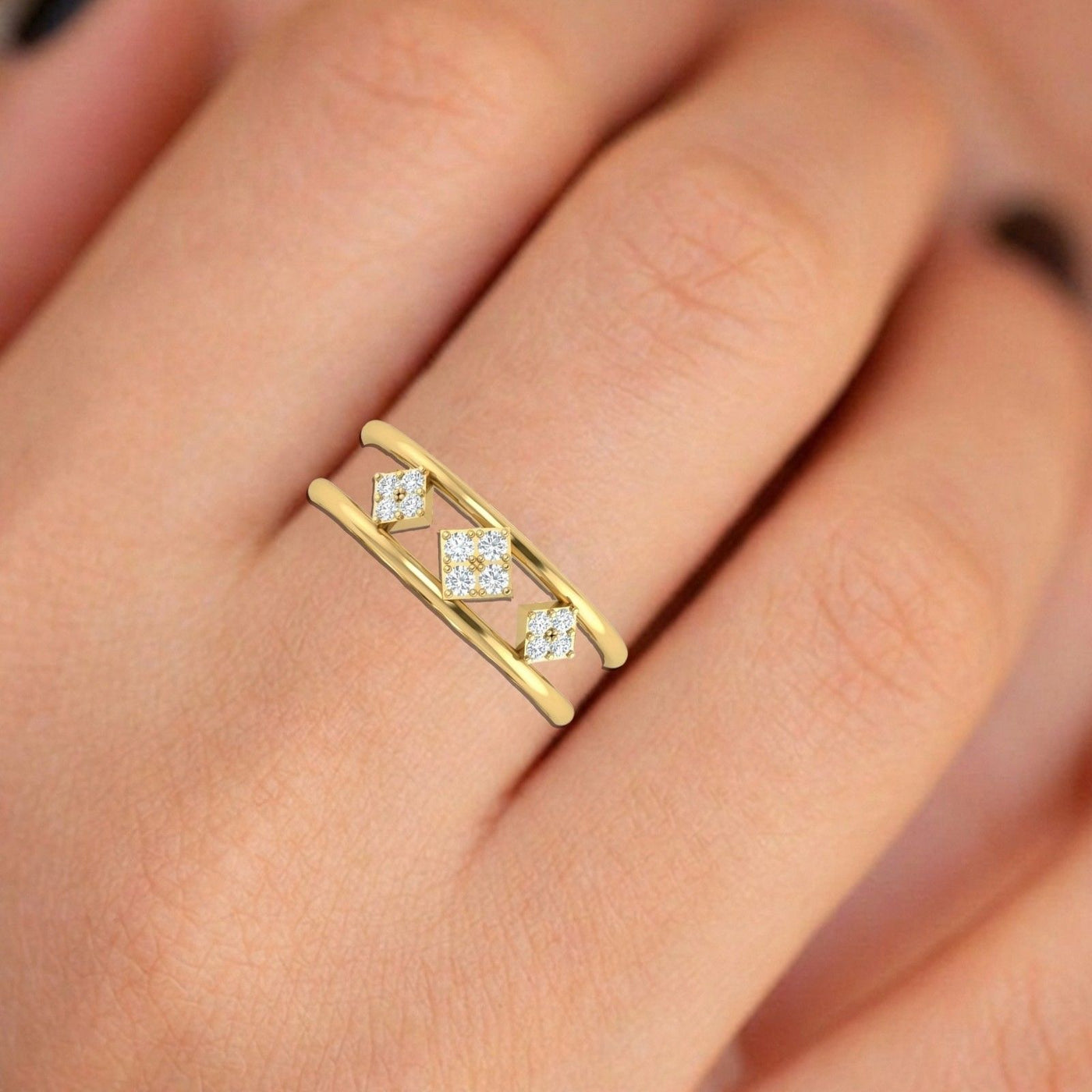 Close-up shot of a gold and diamond with cluster setting ring